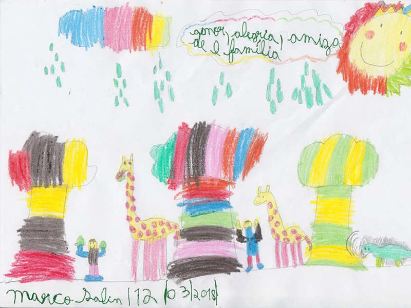 Desenho bastante colorido, com árvores, pessoas, animais, sol e nuvem, com inscrição em que se lê "amor, alegria, amizade e família"